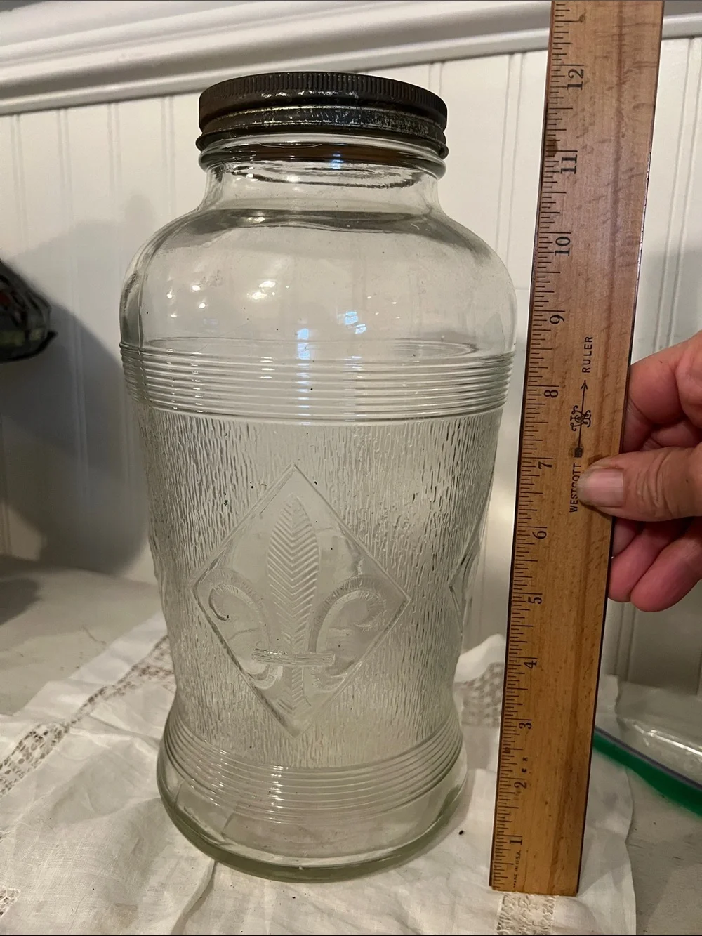 Antique Fleur de lis large ribbed glass jar 12”